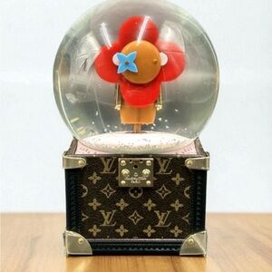 Louis Vuitton Festive Snow Globe with Red and Brown Design
